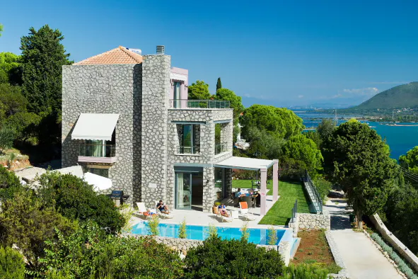Stone villa with its pool and terrace, the sea beyond